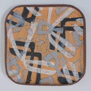 large decorative plate with garden motifs